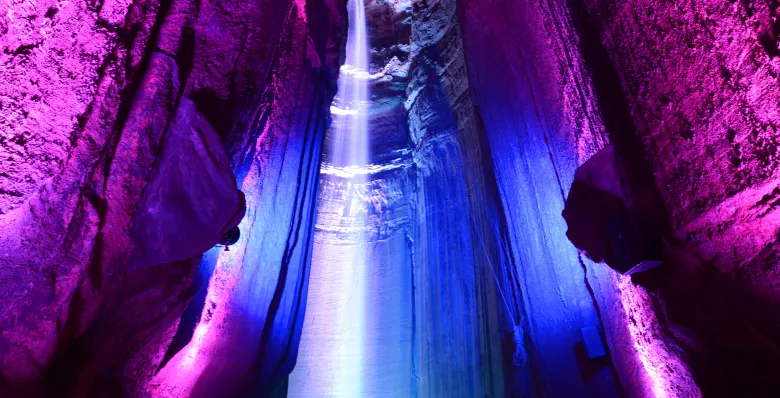 A cold waterfall cascades inside the cave walls,  And echoes through the cool, damp air, Stalactites and stalagmites they rise and they fall, Deep in the heart mountain.  Written about Ruby Falls in Chattanooga, Tennessee.