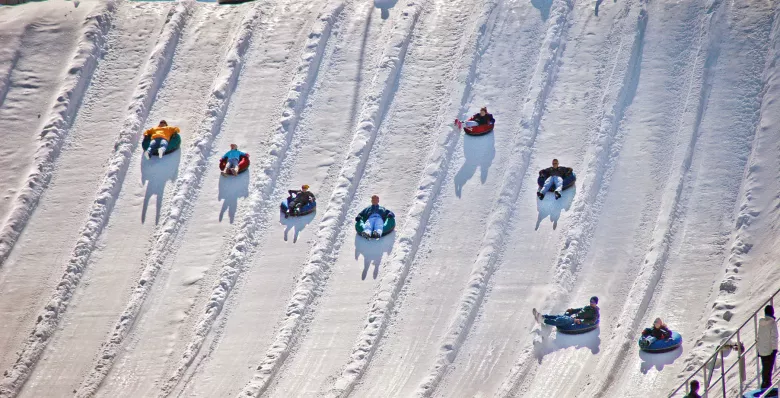 Bundle up well when the cold winter wind blows, Race down the hill on a tube in the snow, Catch the magic carpet back up to the top, Again and again the fun never stops. Written about Ober Mountain in Gatlinburg, Tennessee.