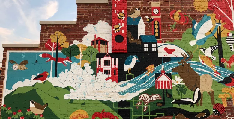 Mural of outdoor activities found in Johnson City during the Meet the Mountains Festival.