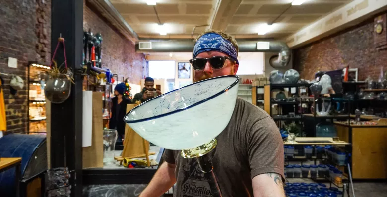 A glass bowl being made at Pretentious Glass Co.