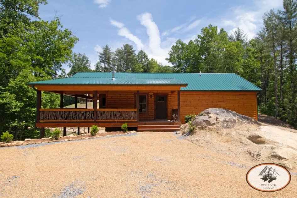 Bear Cub Cabin: 2 Bed, 1 Bath, with garage, hot tub, grill, fully equipped kitchen, fireplace, and private campsite at Doe River Landing, campground in Roan Mountain, Tennessee.